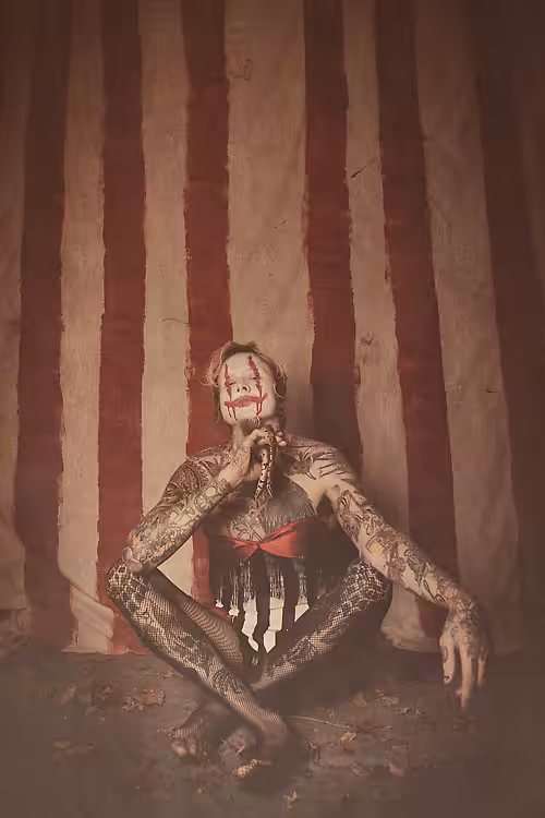 Carnival Freak, a Joker in this Land
