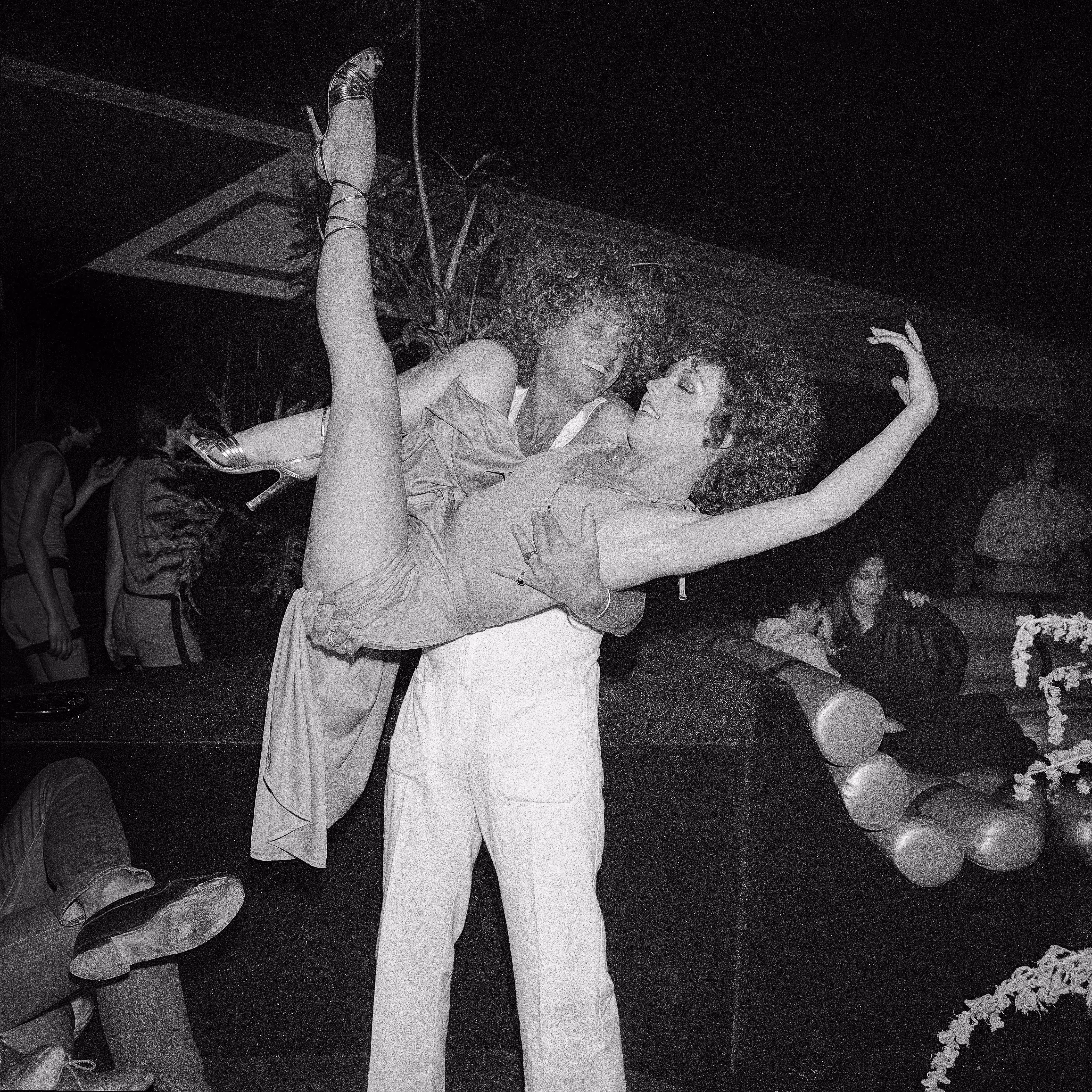 QuirkyVision 45RPM - Holding leg up high at Studio 54
