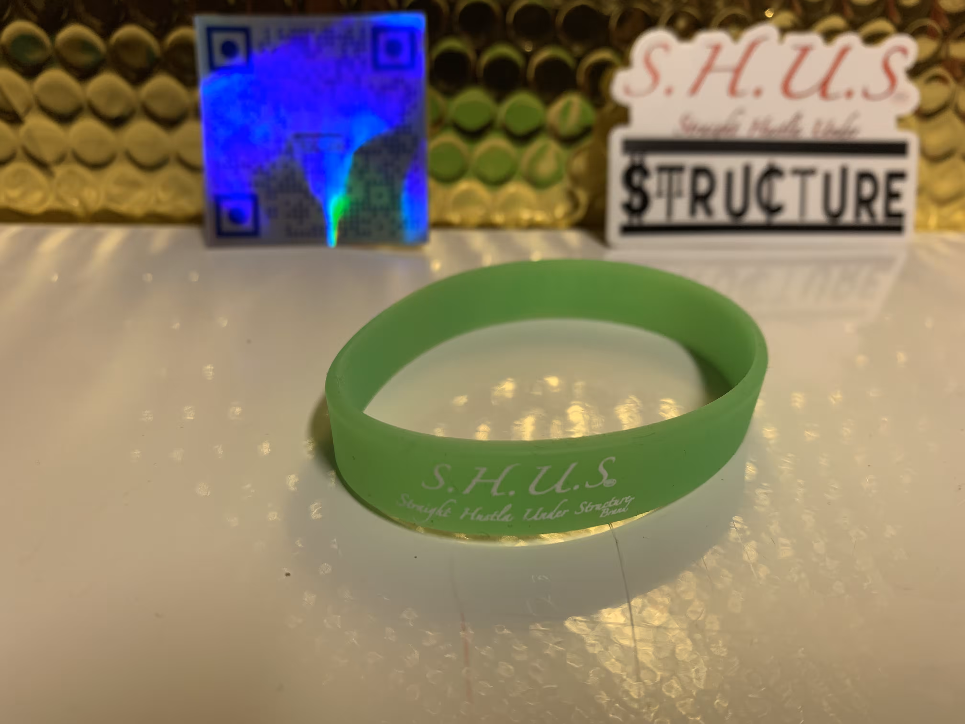 SHUS Brand Glow in dark Green wrist band 