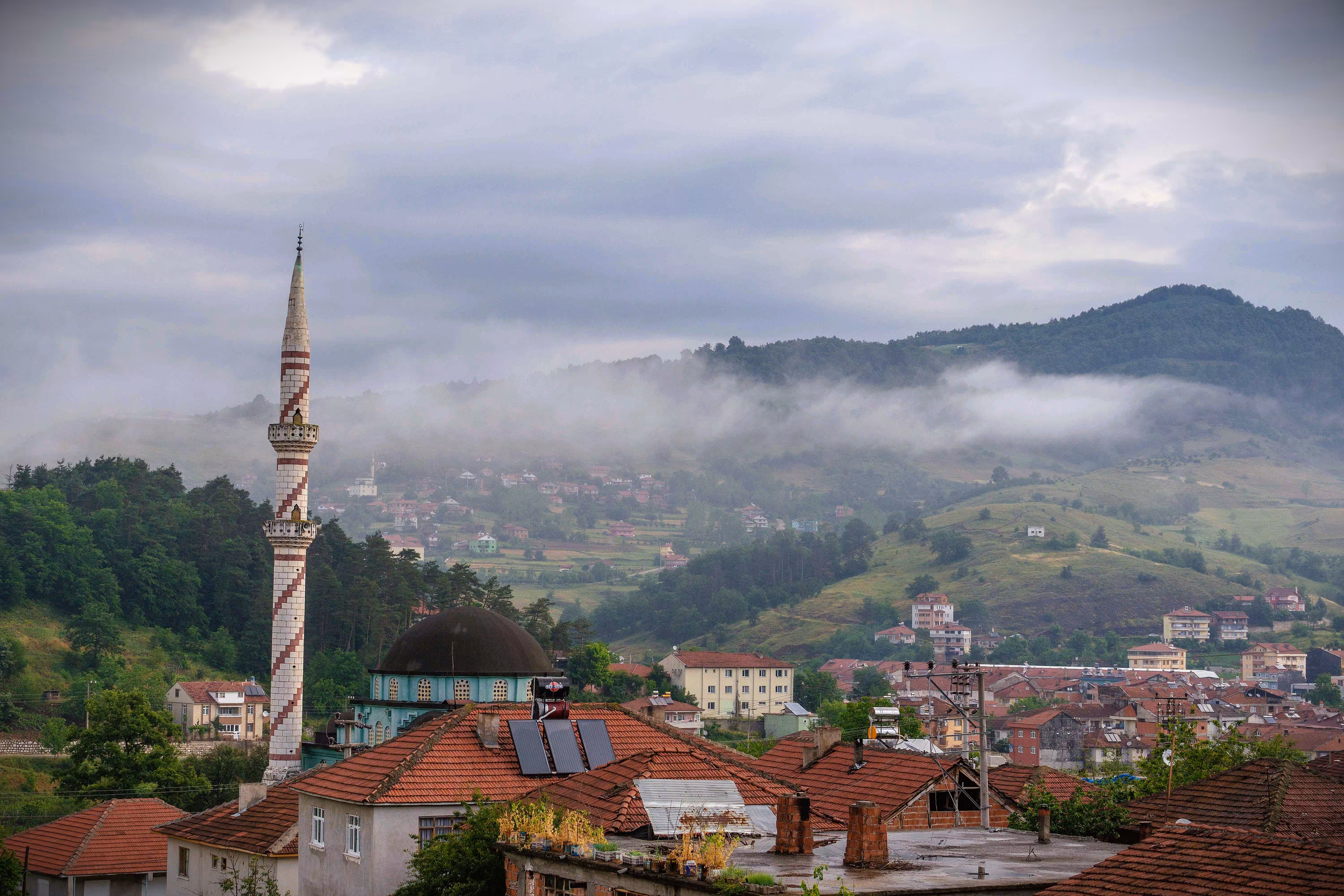 Landscapes: Between Clouds and Prayers