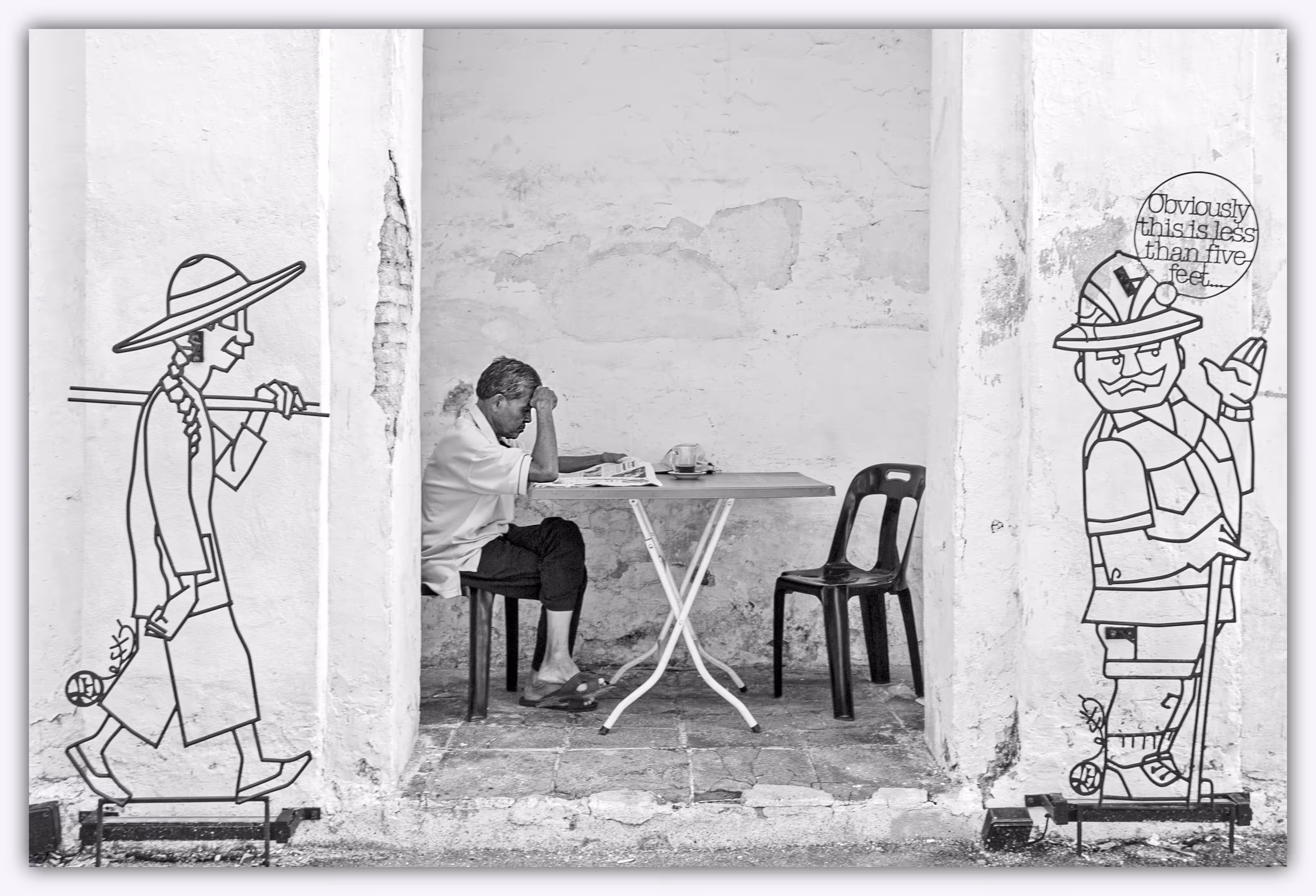 Old man and art wall