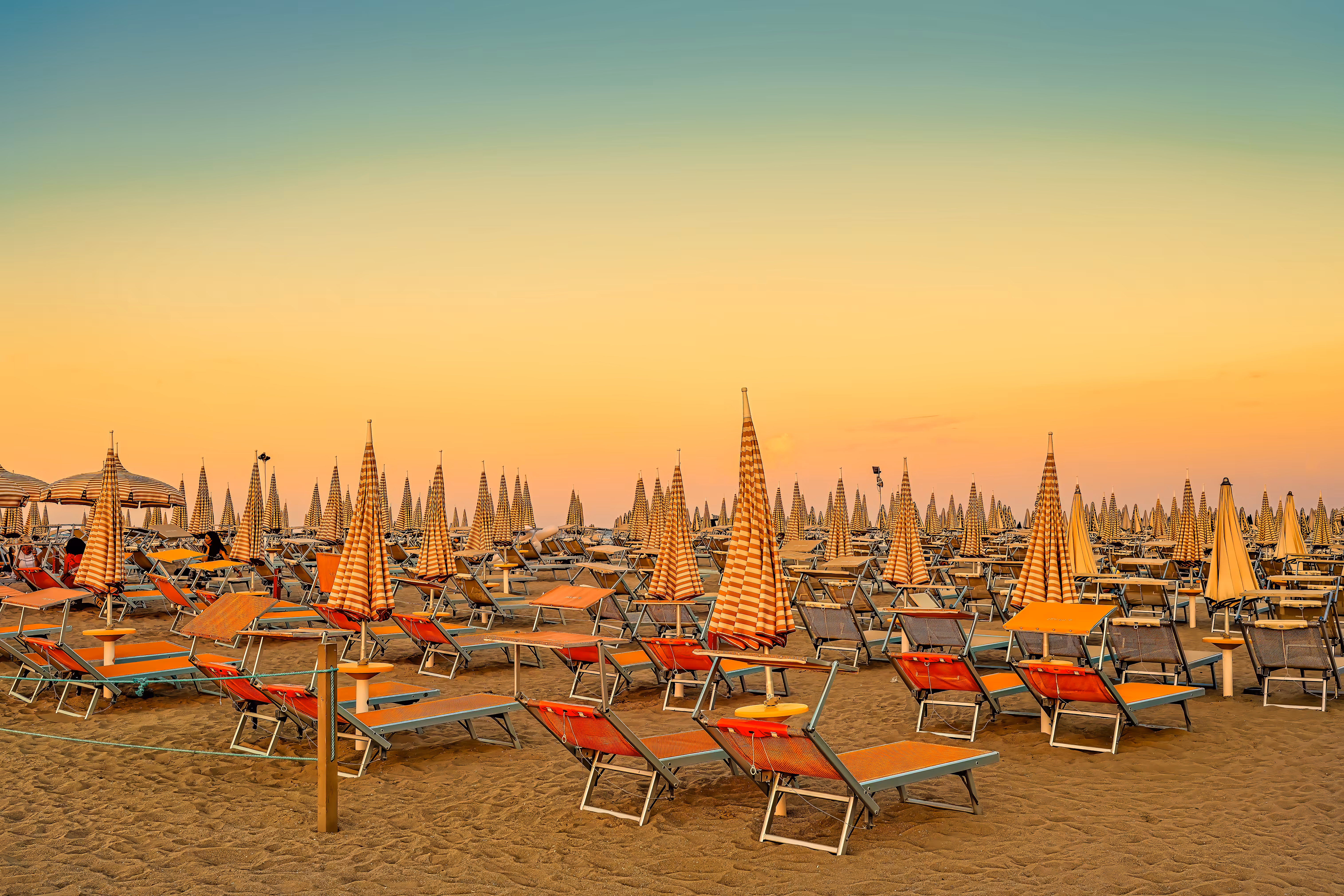 Sunsets and Sunrises: Cesenatico – Geometries of Summer at Sunset