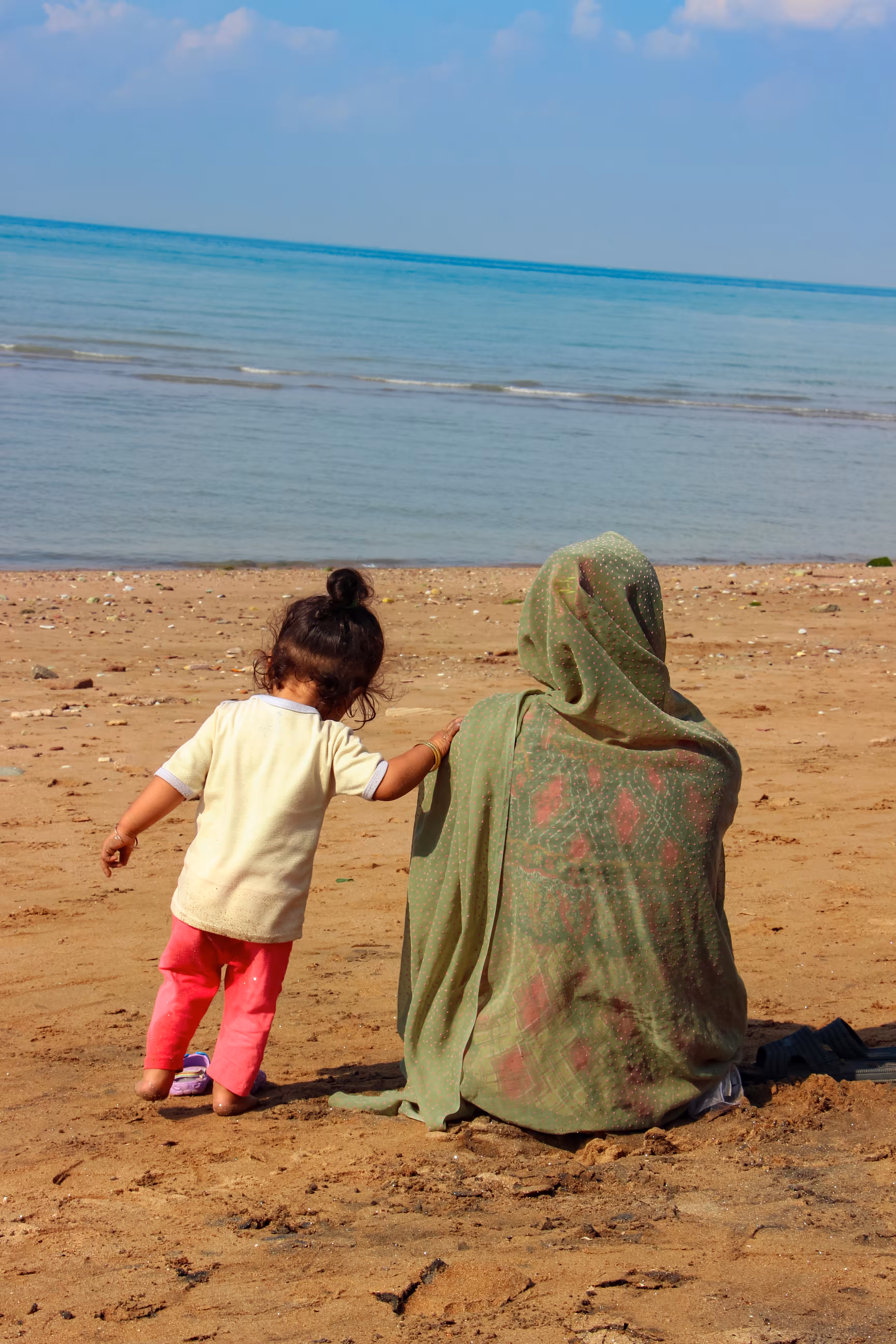 A Mother, A Child, The Sea