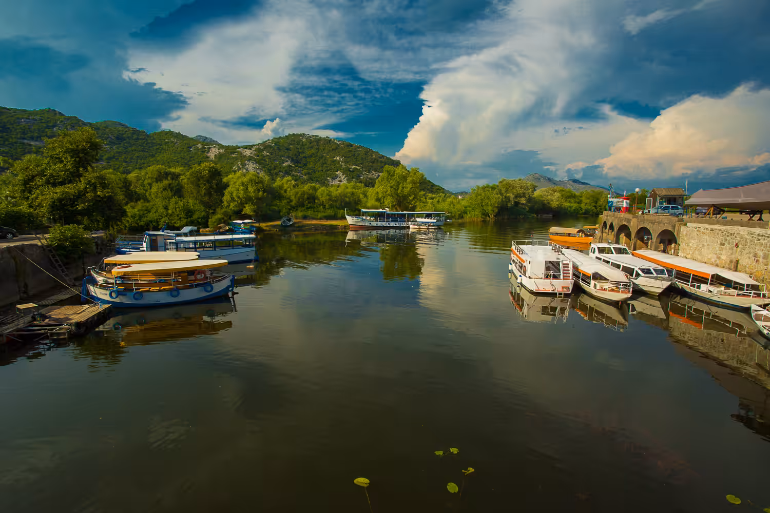 Boats, mountains and clouds