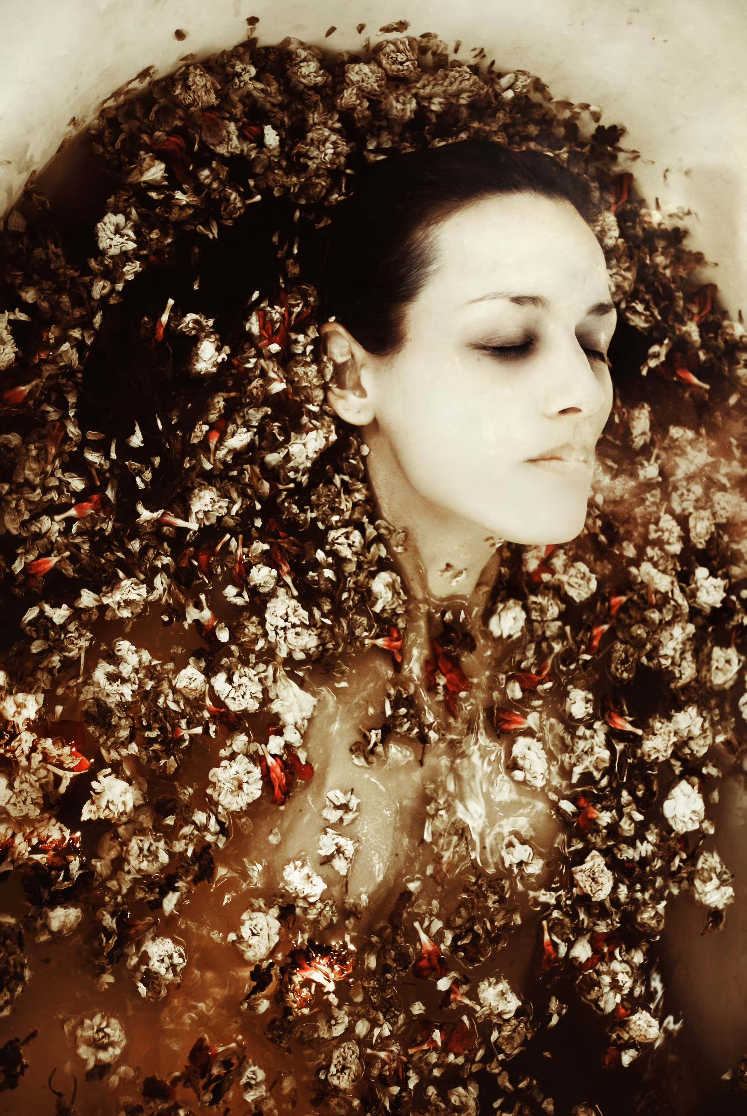 Recolectora de flores marchitas