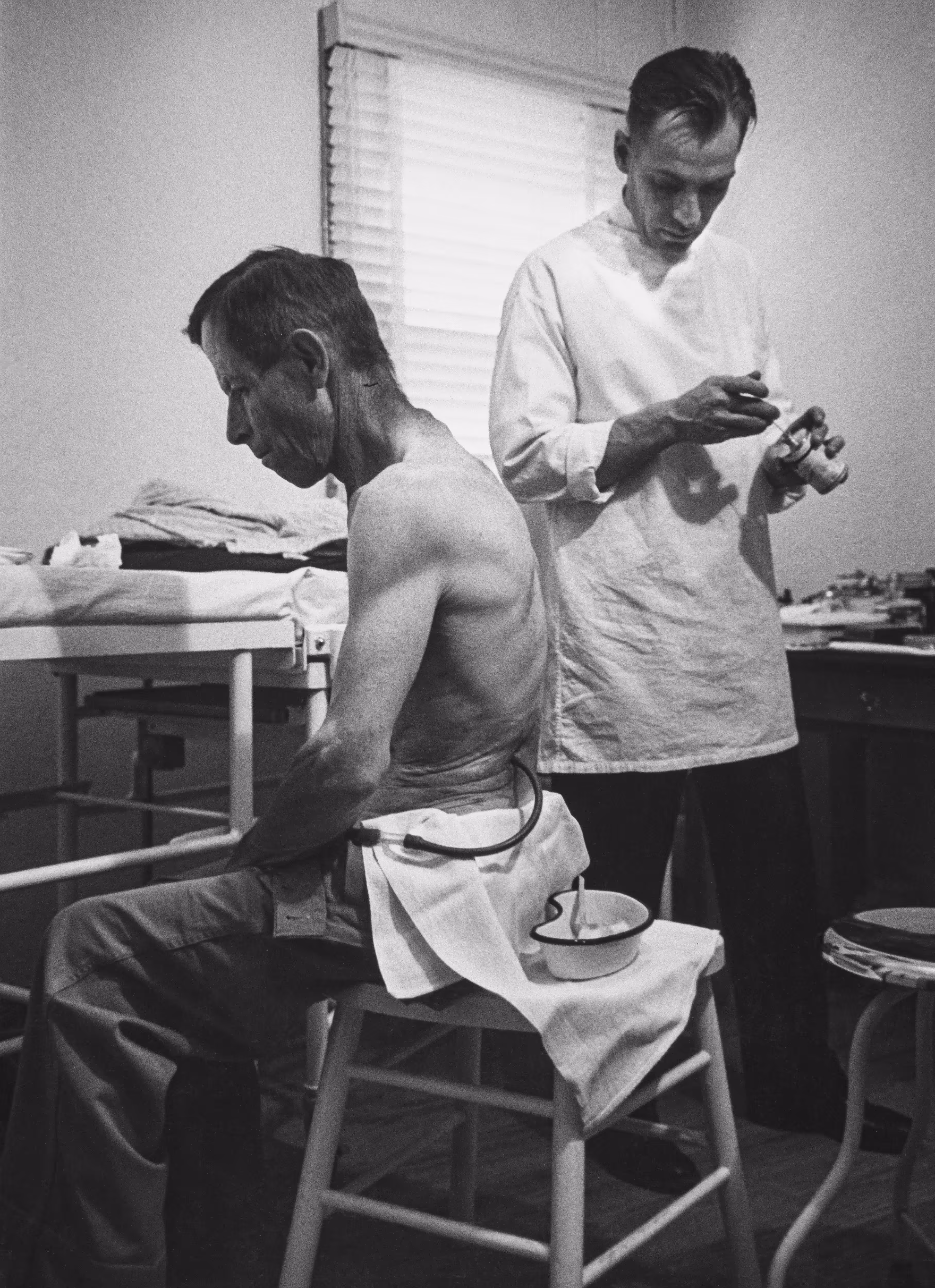 Country Doctor -  Dr. Ernest Ceriani Treating Patient in Examination Room