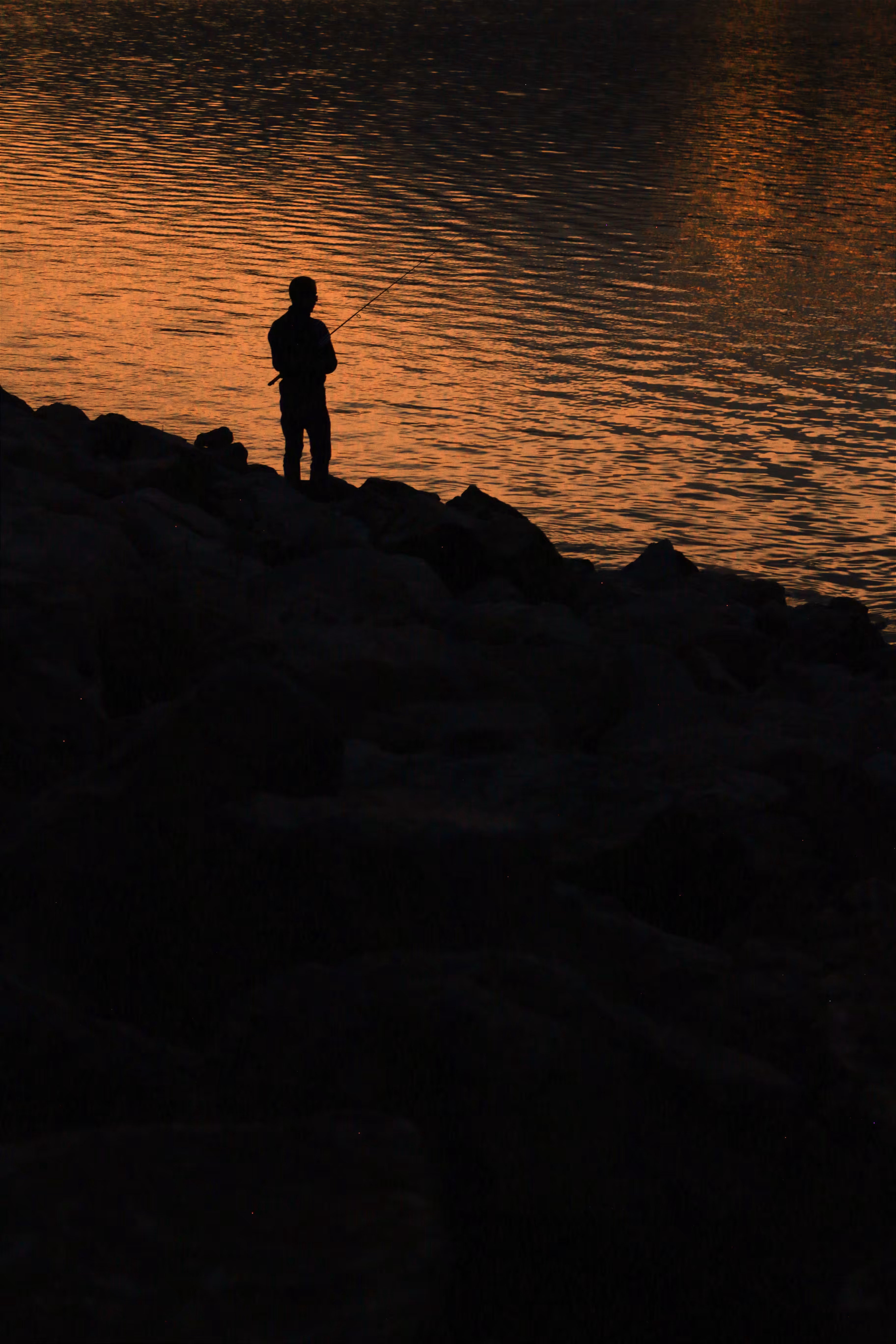 with the wind : Fishing at sunset