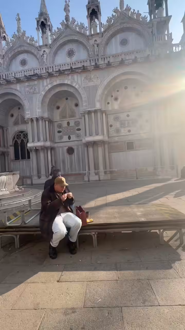 rolling a cigarette in venice.