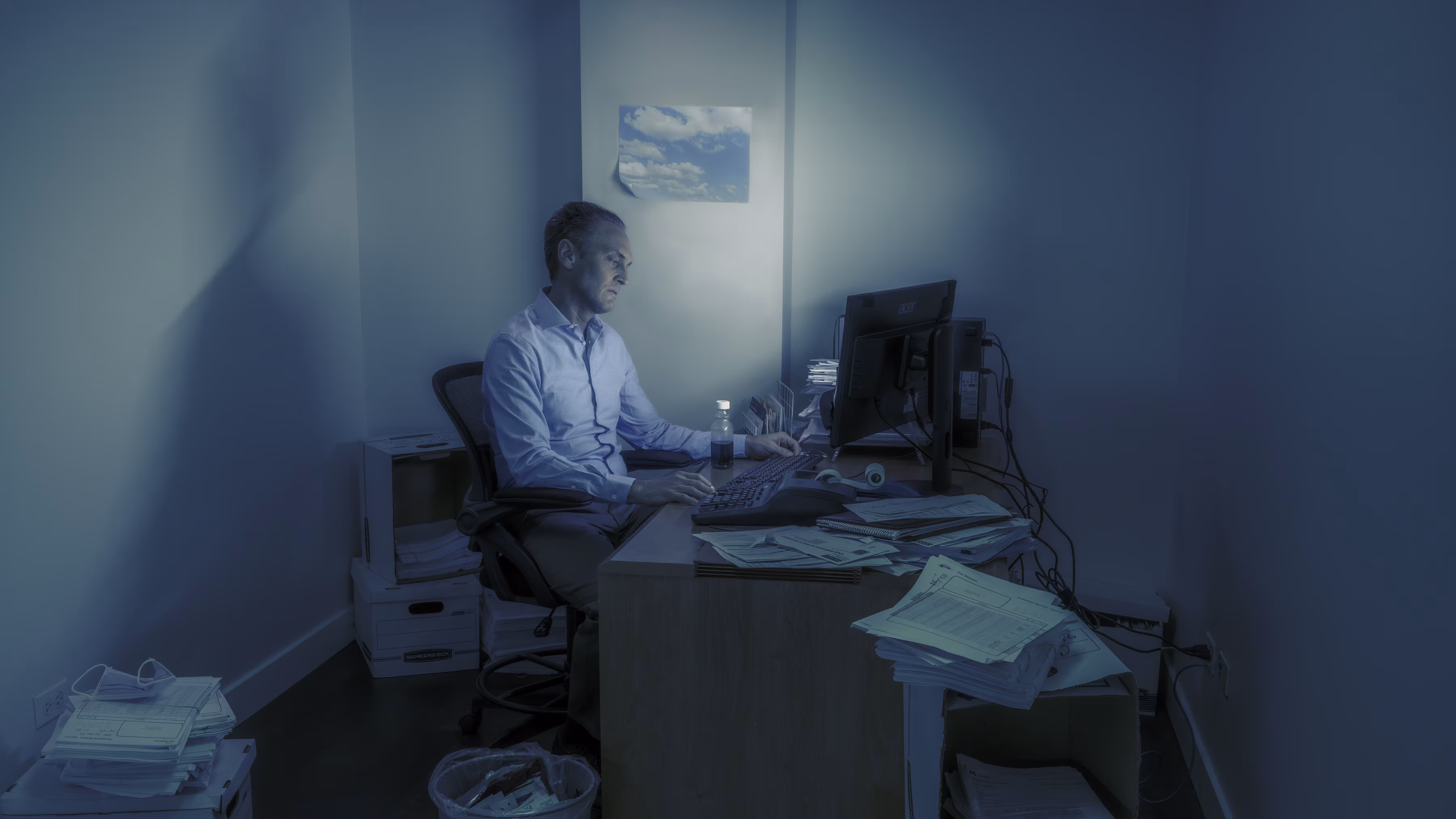 Ernest in His Office at the Trucking Company