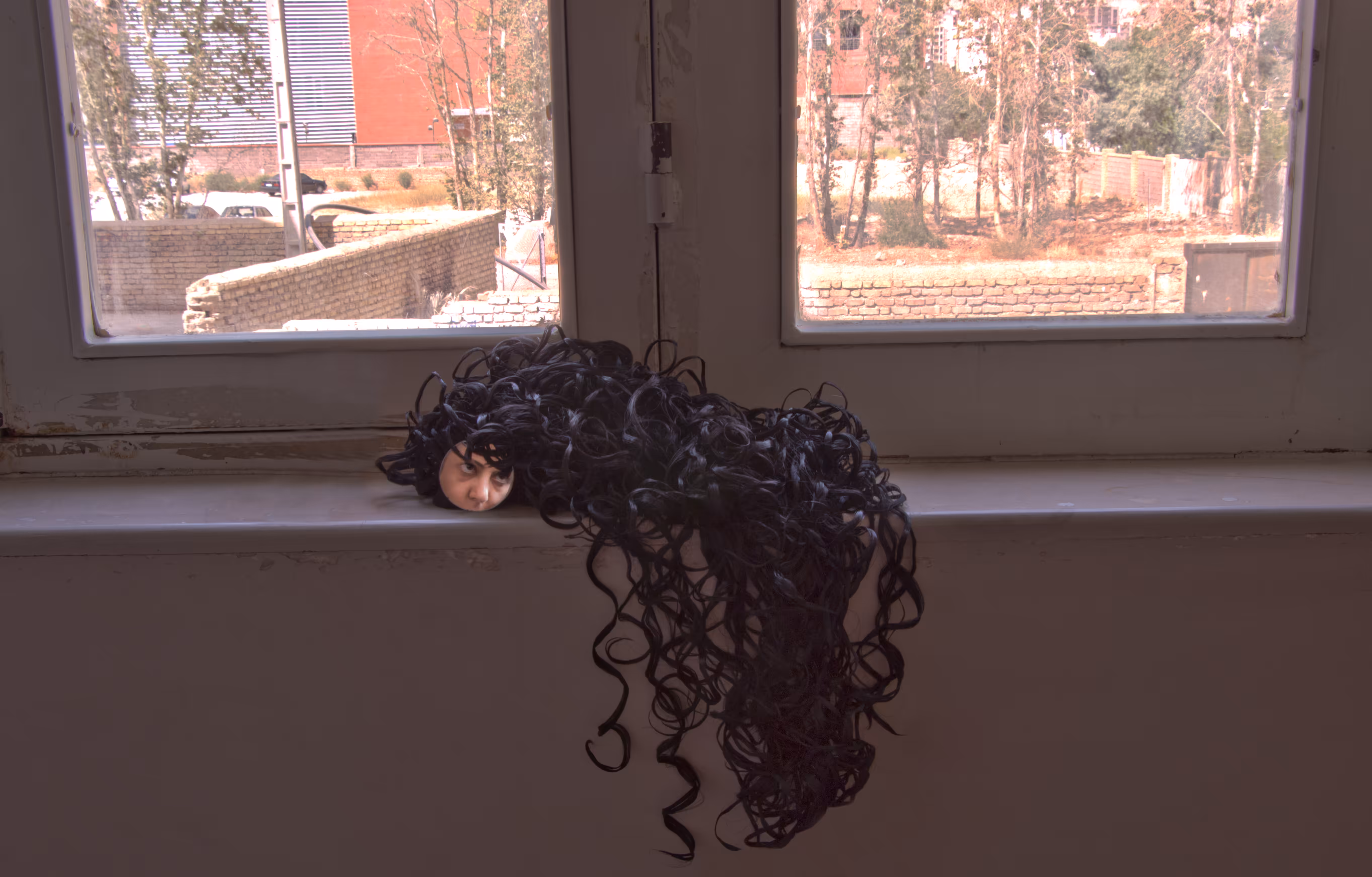 The woman behind the window