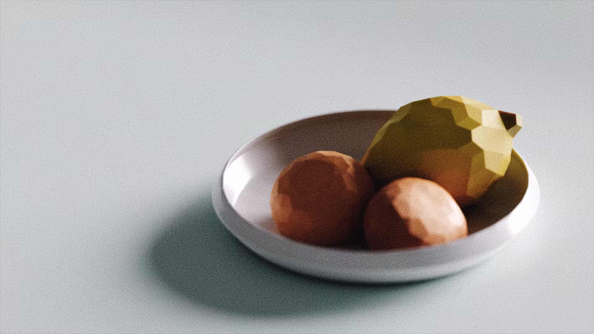 A Couple of Tangerines and a Lemon on a Porcelain Bowl