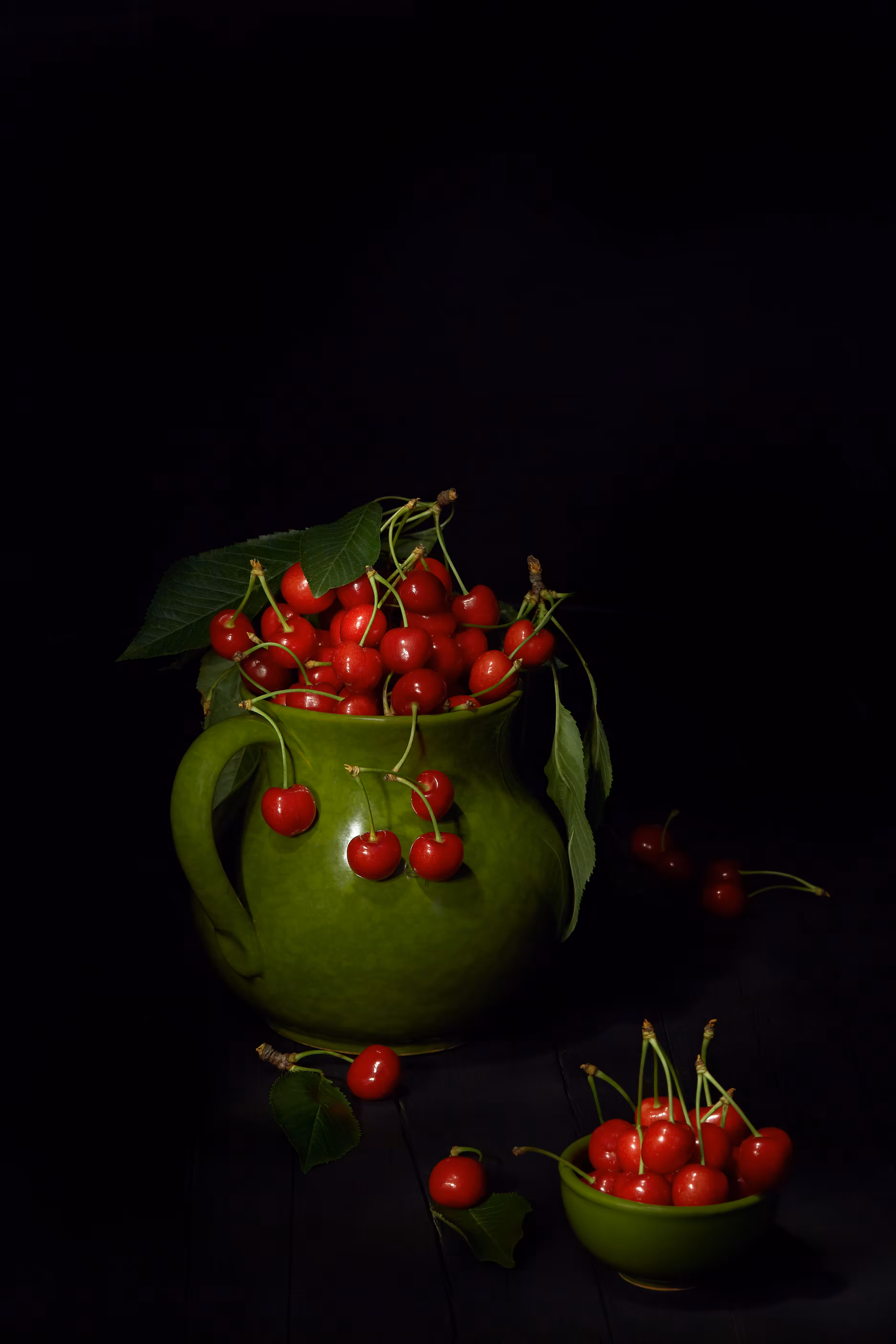 Pitcher with cherries