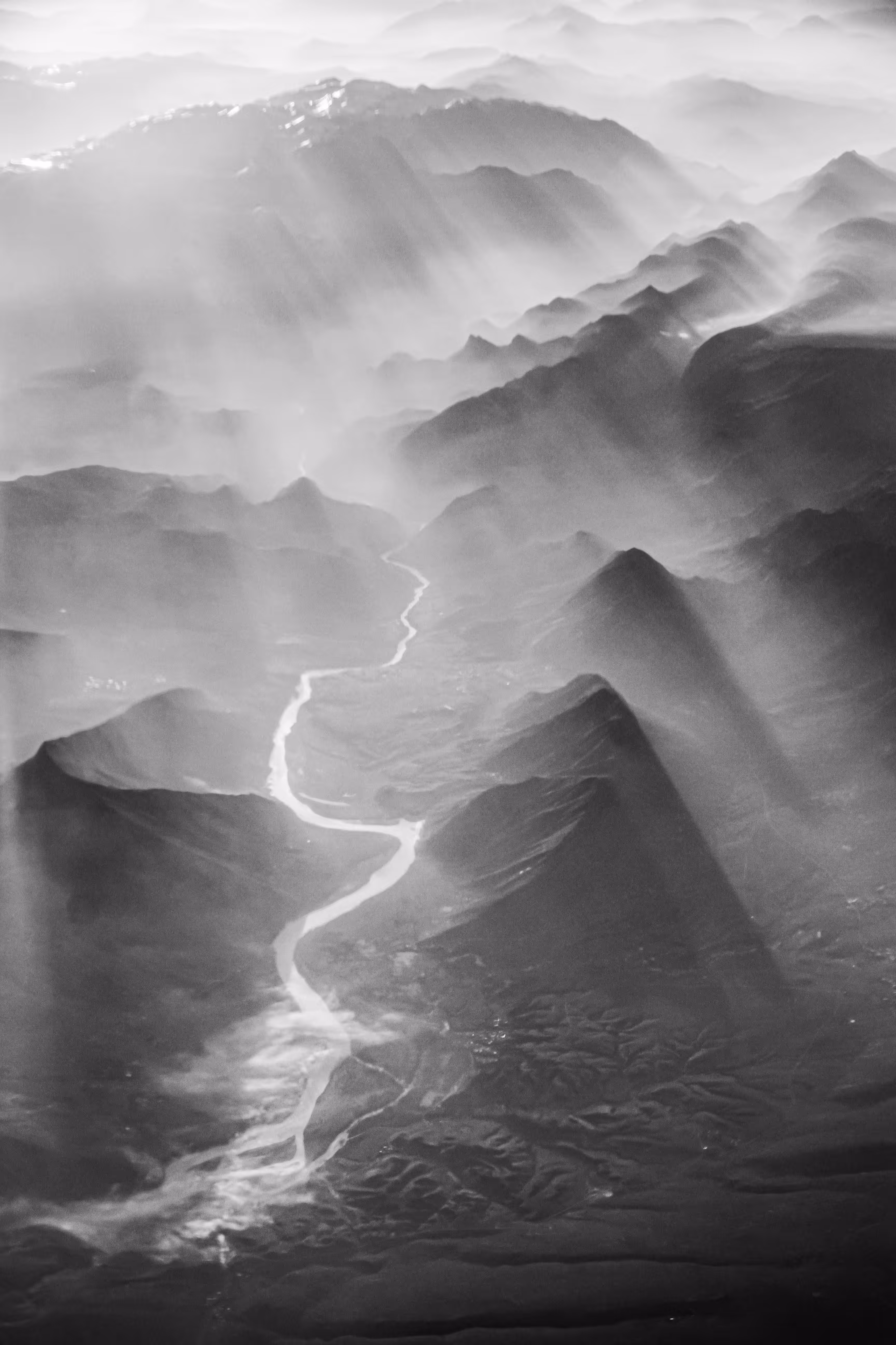 A River's Embrace in the Mountains