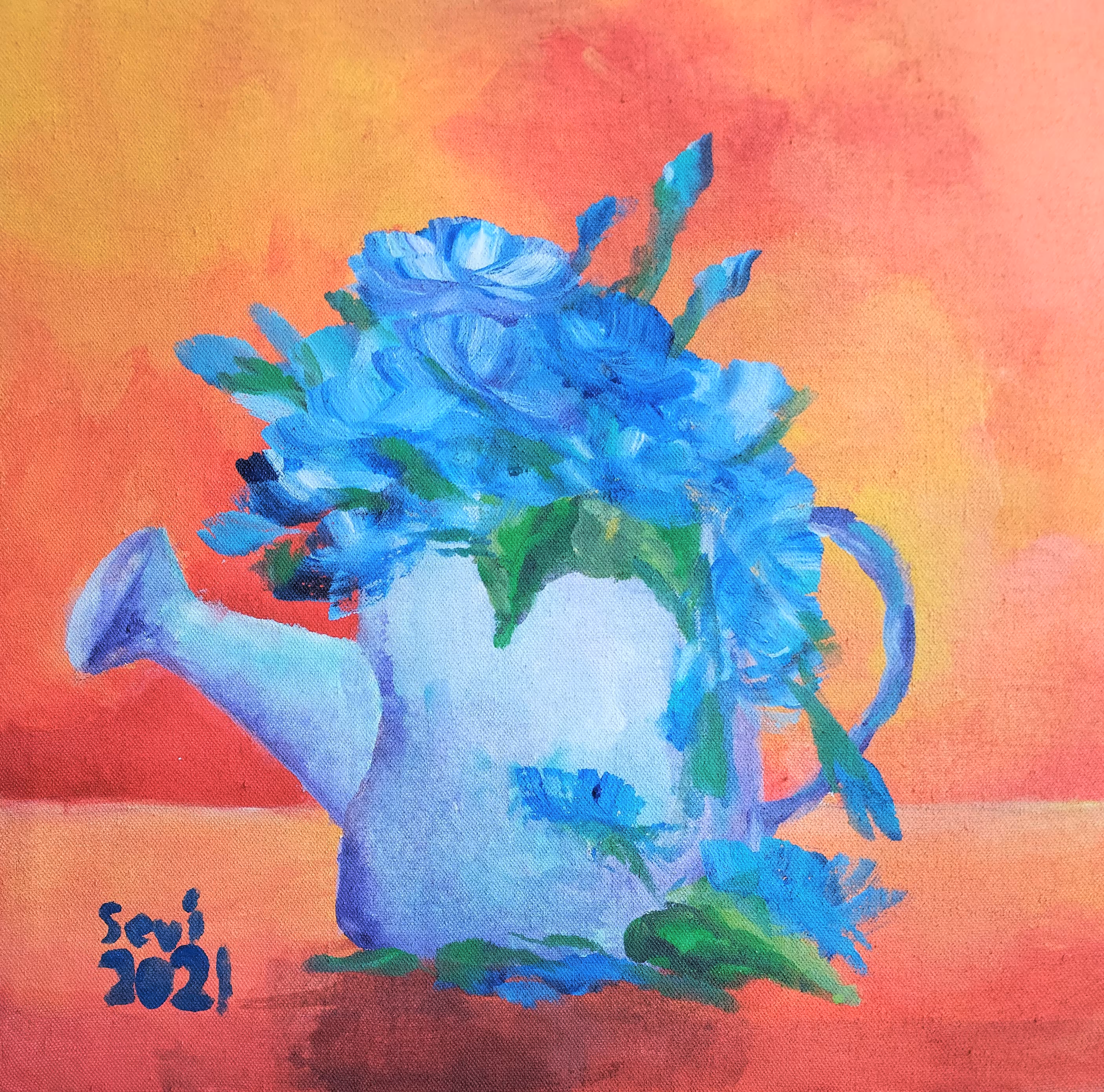 Watering can with flowers