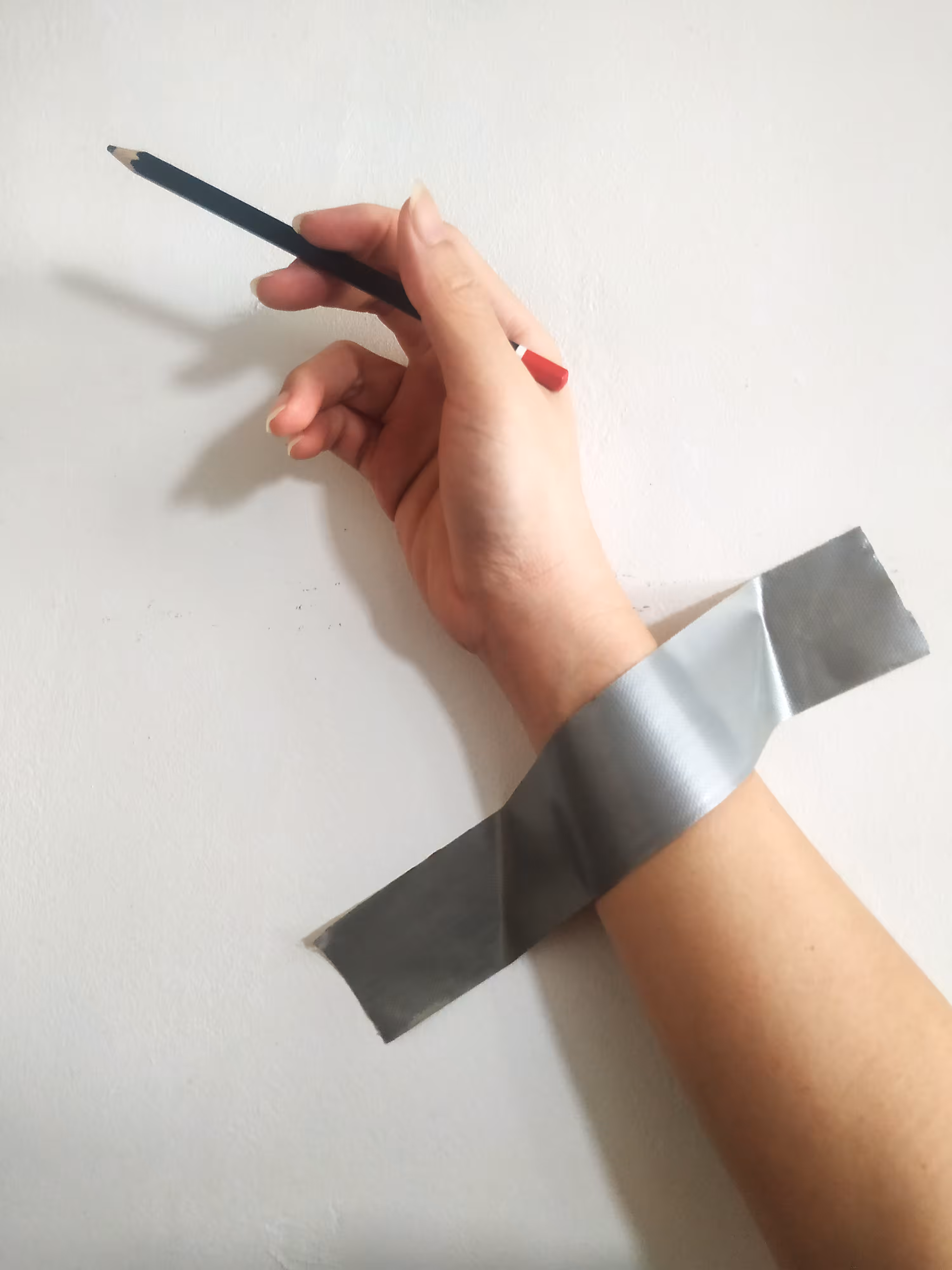 Artist Taped on the Wall