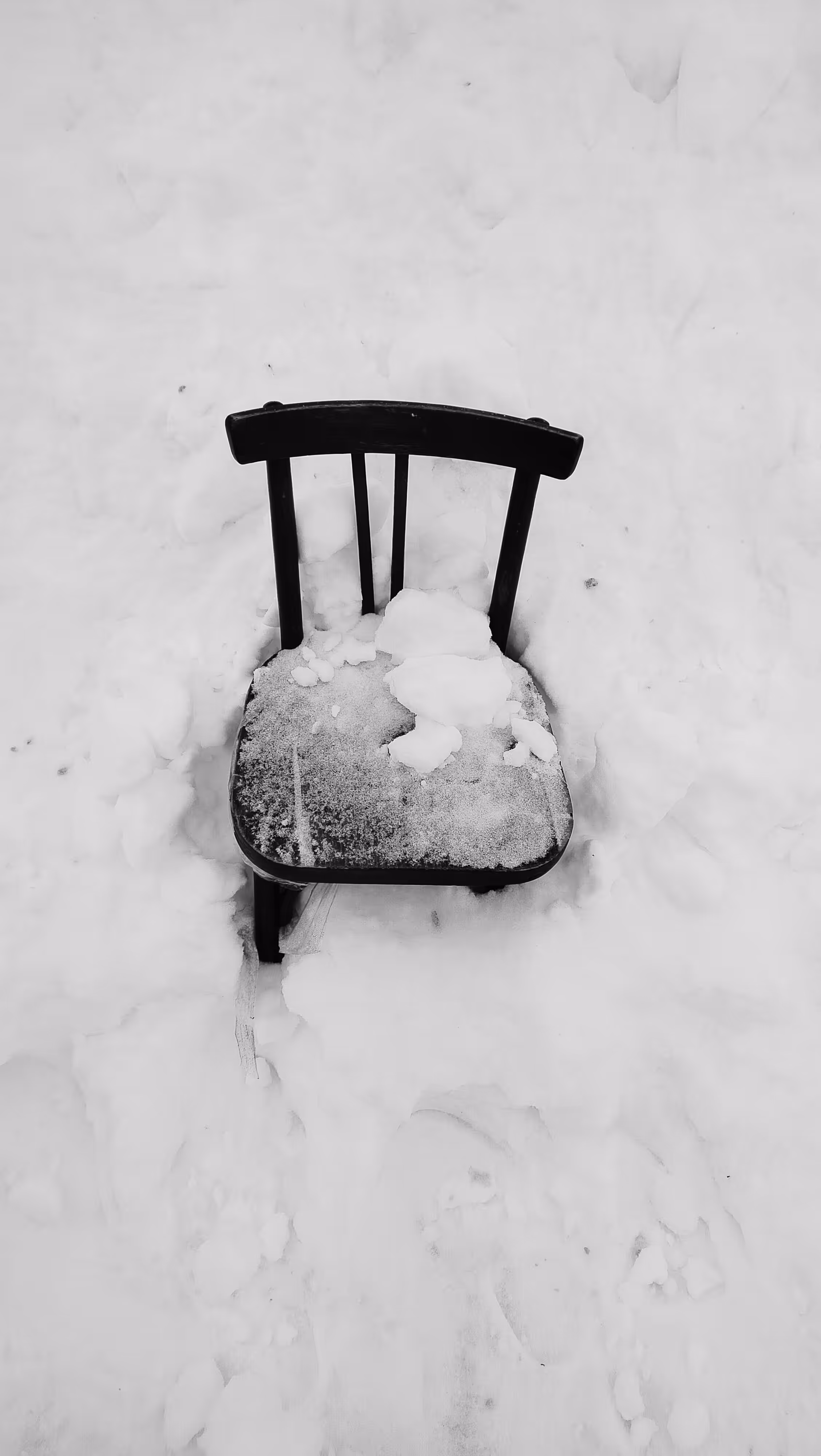 A chair in the snow