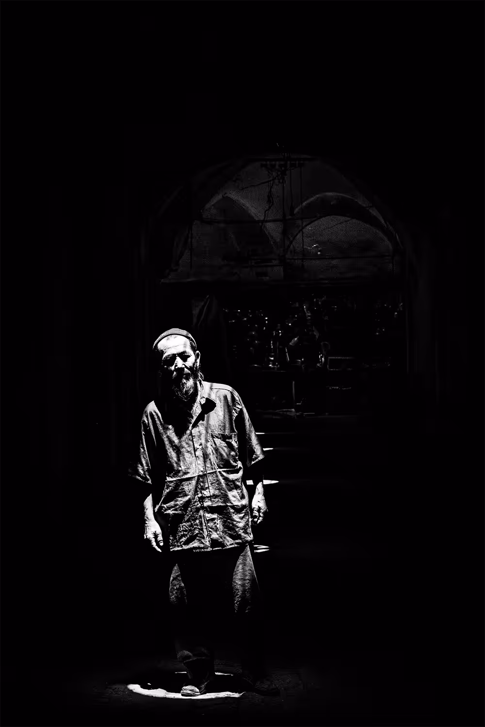 Old Afghan man under the light