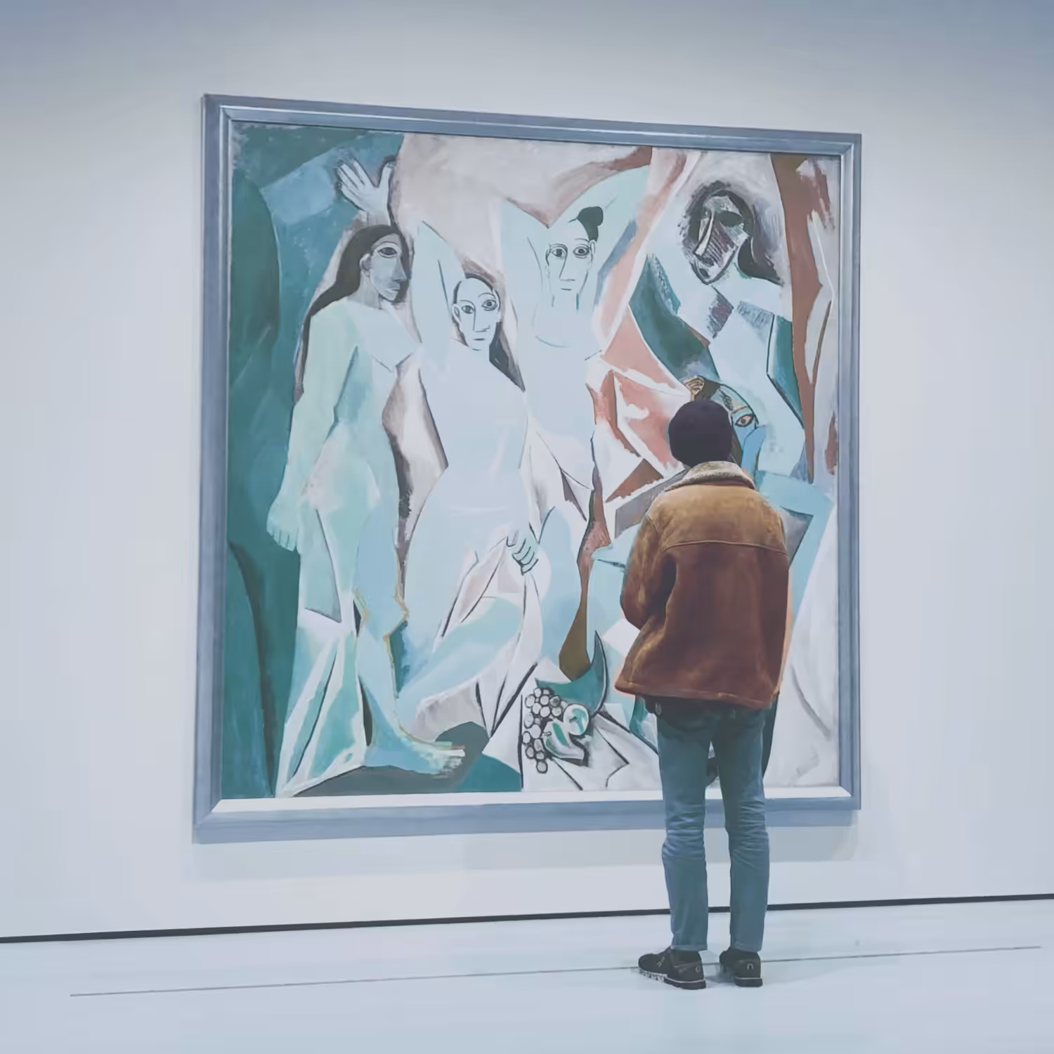 THE ARTIST LOOKING AT THE ART