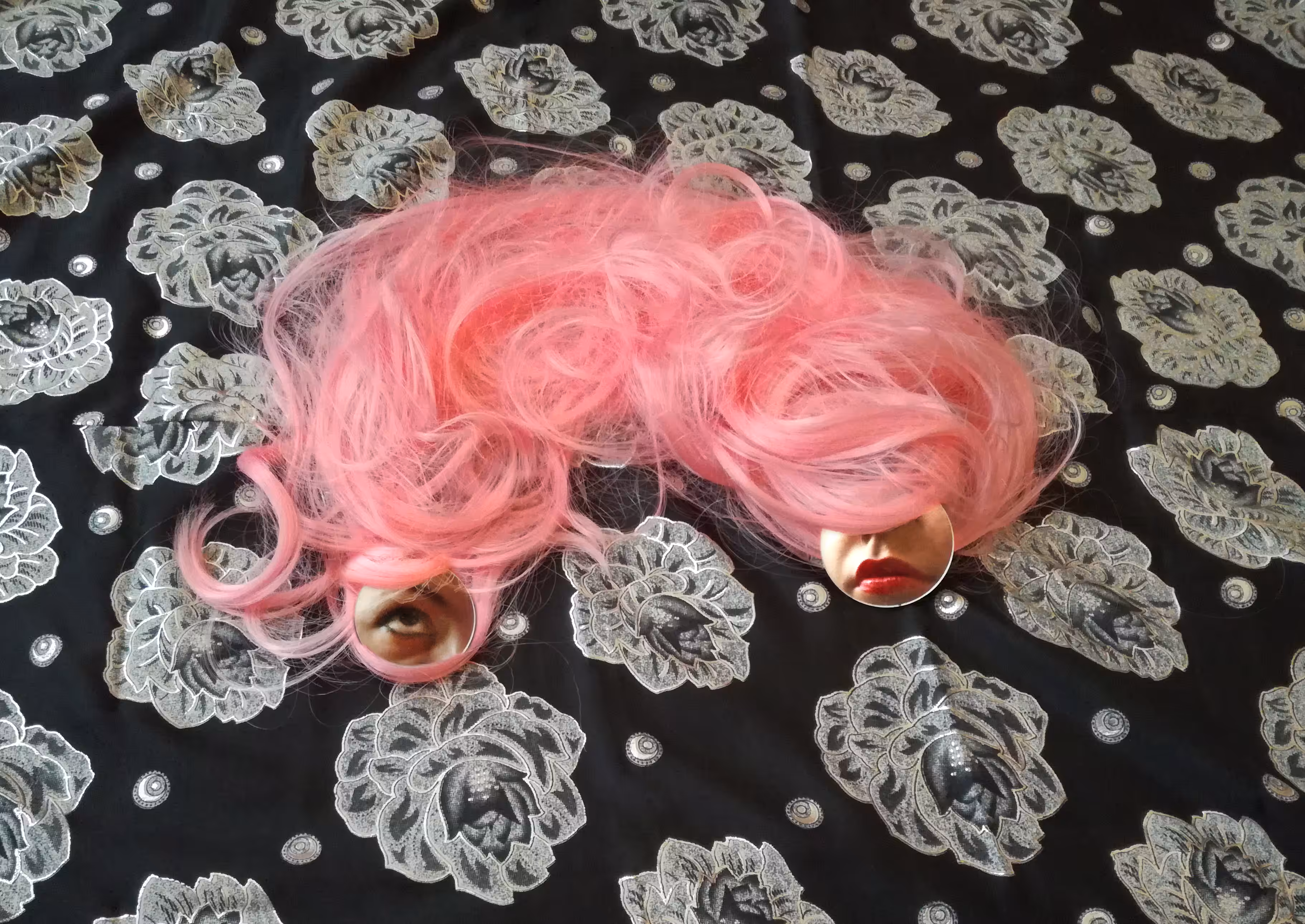 pink hair in the middle of the black garden