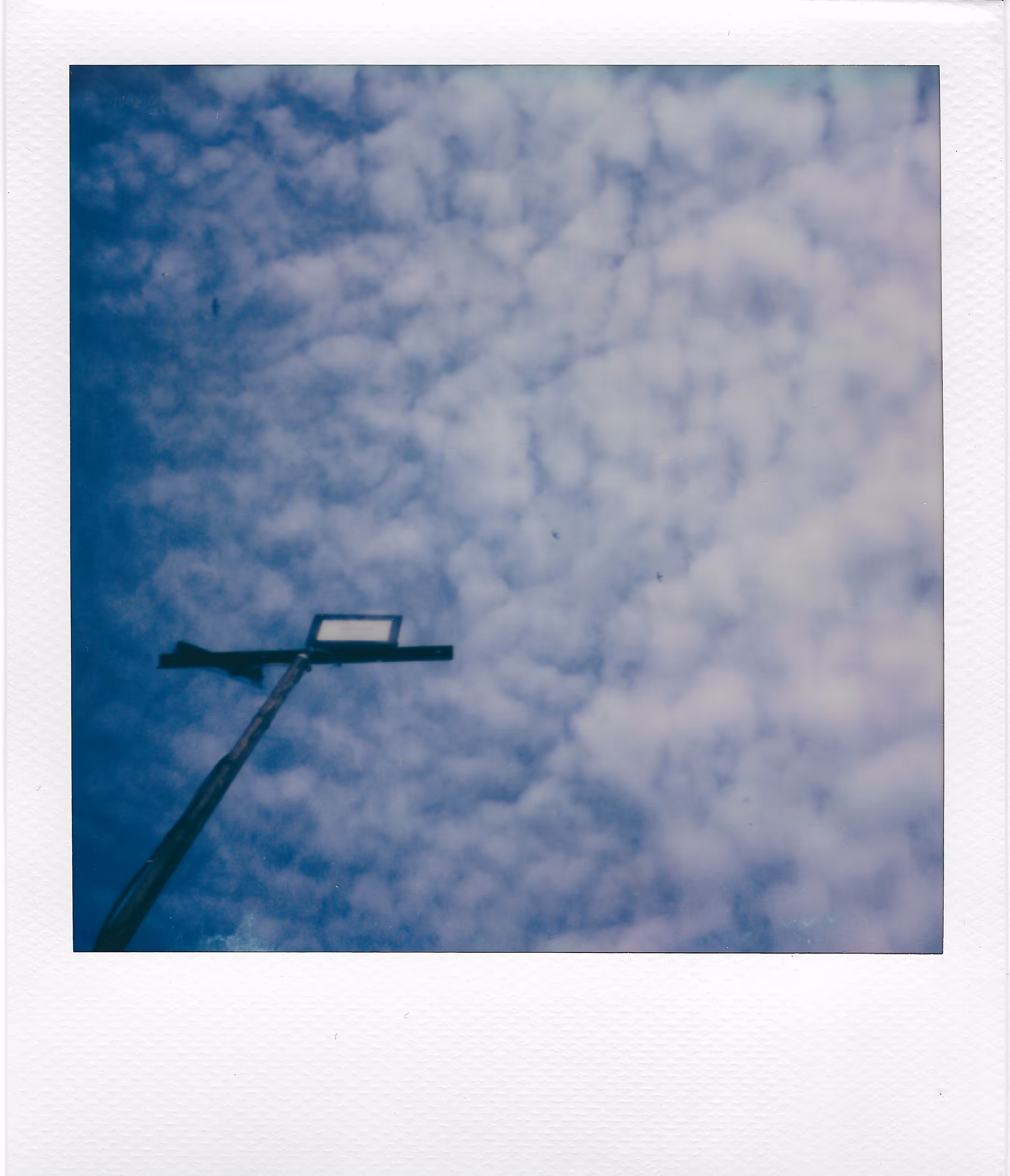 Polaroid Micro Collections: Light on sky Ripples
