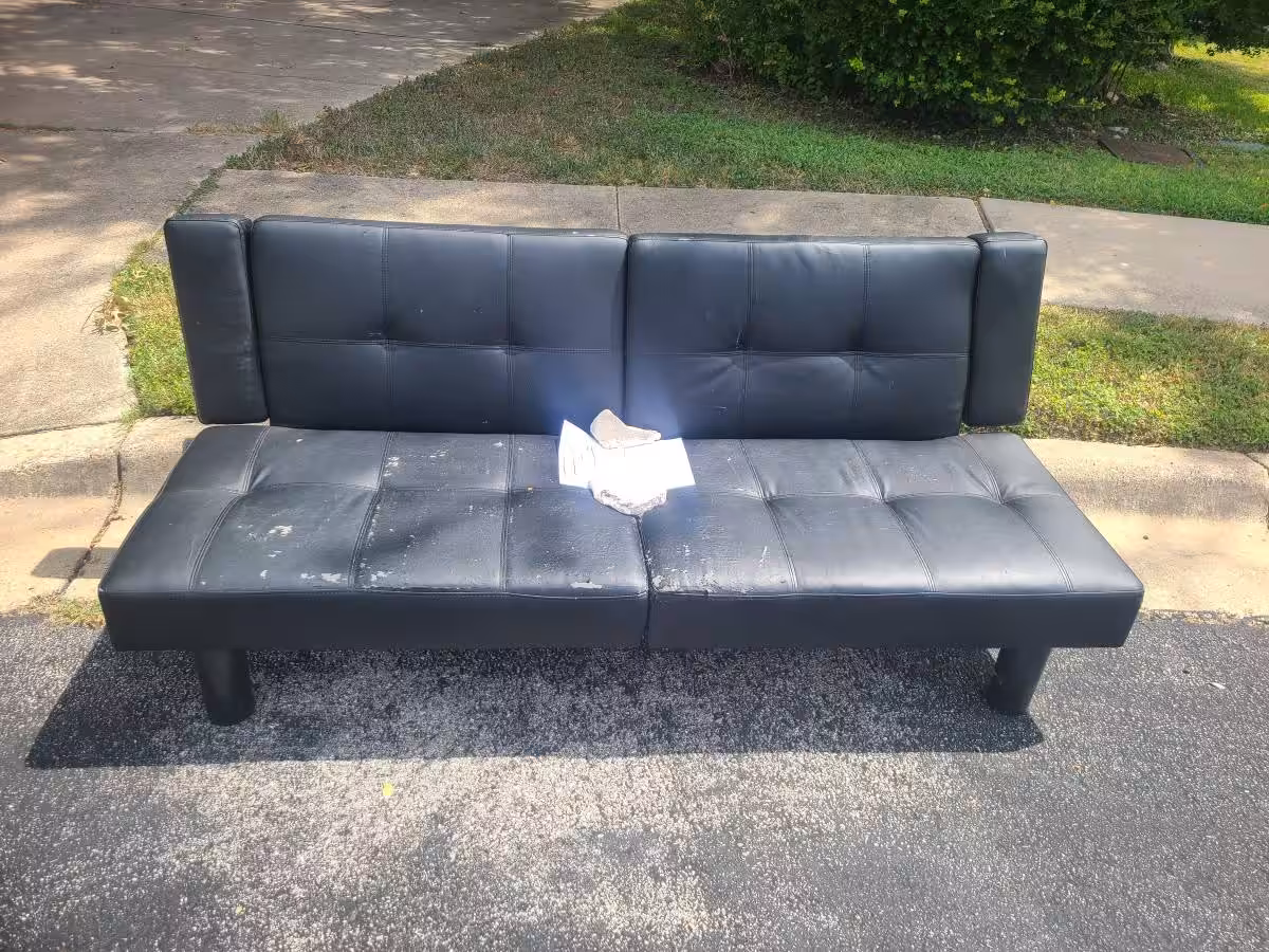 Free black futon couch (Round Rock - Cat Hollow)