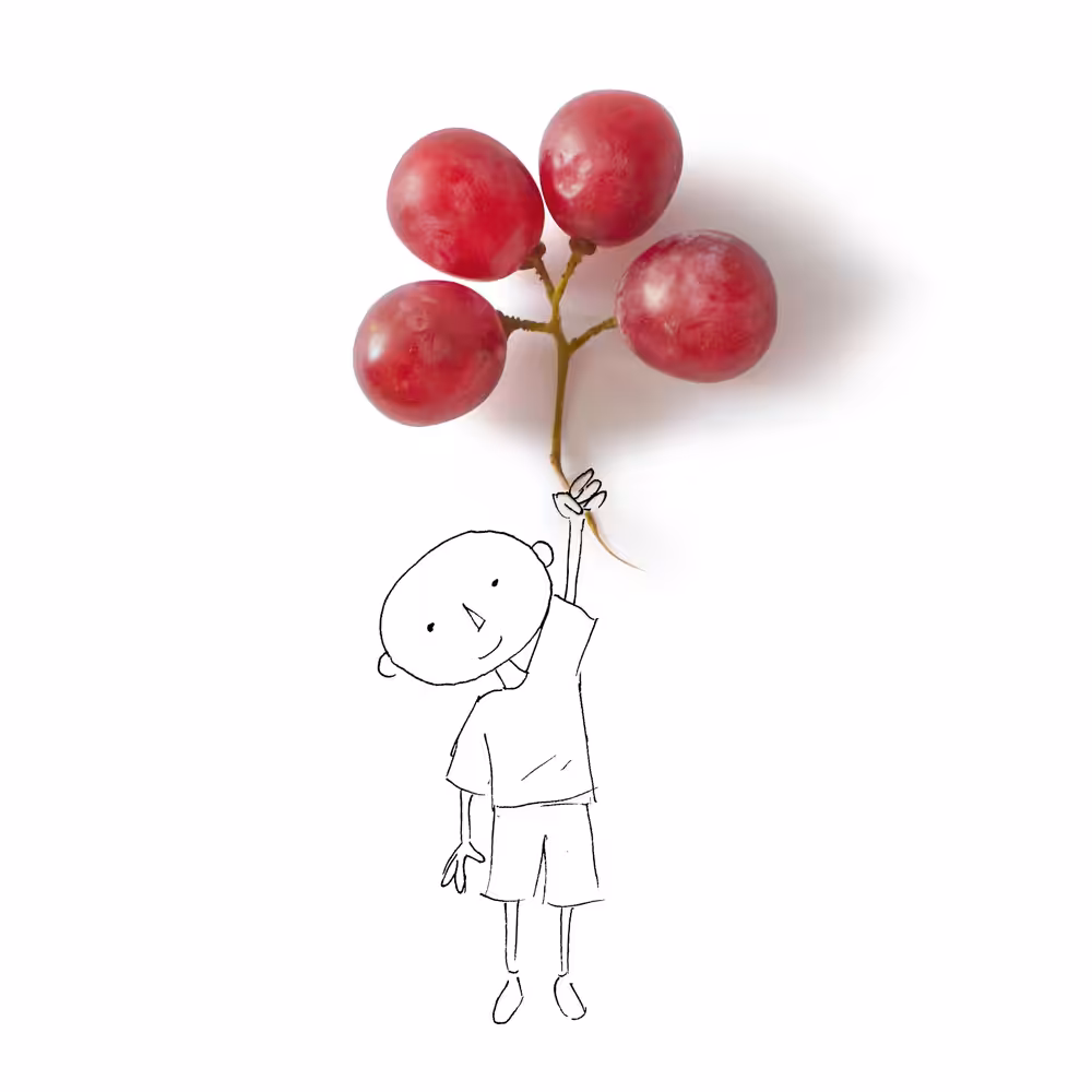 Boy with grapes
