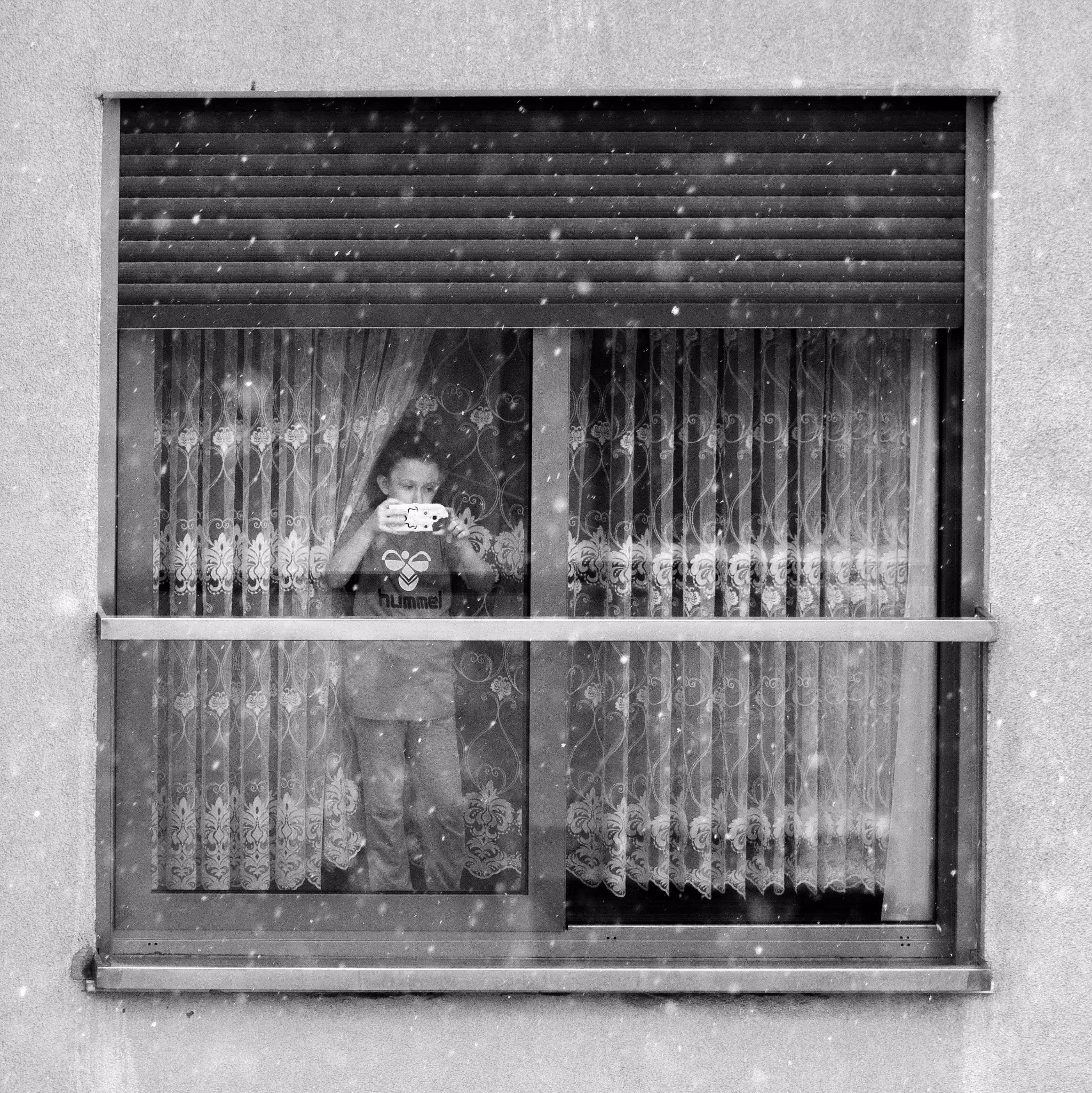 Boy behind the Windows