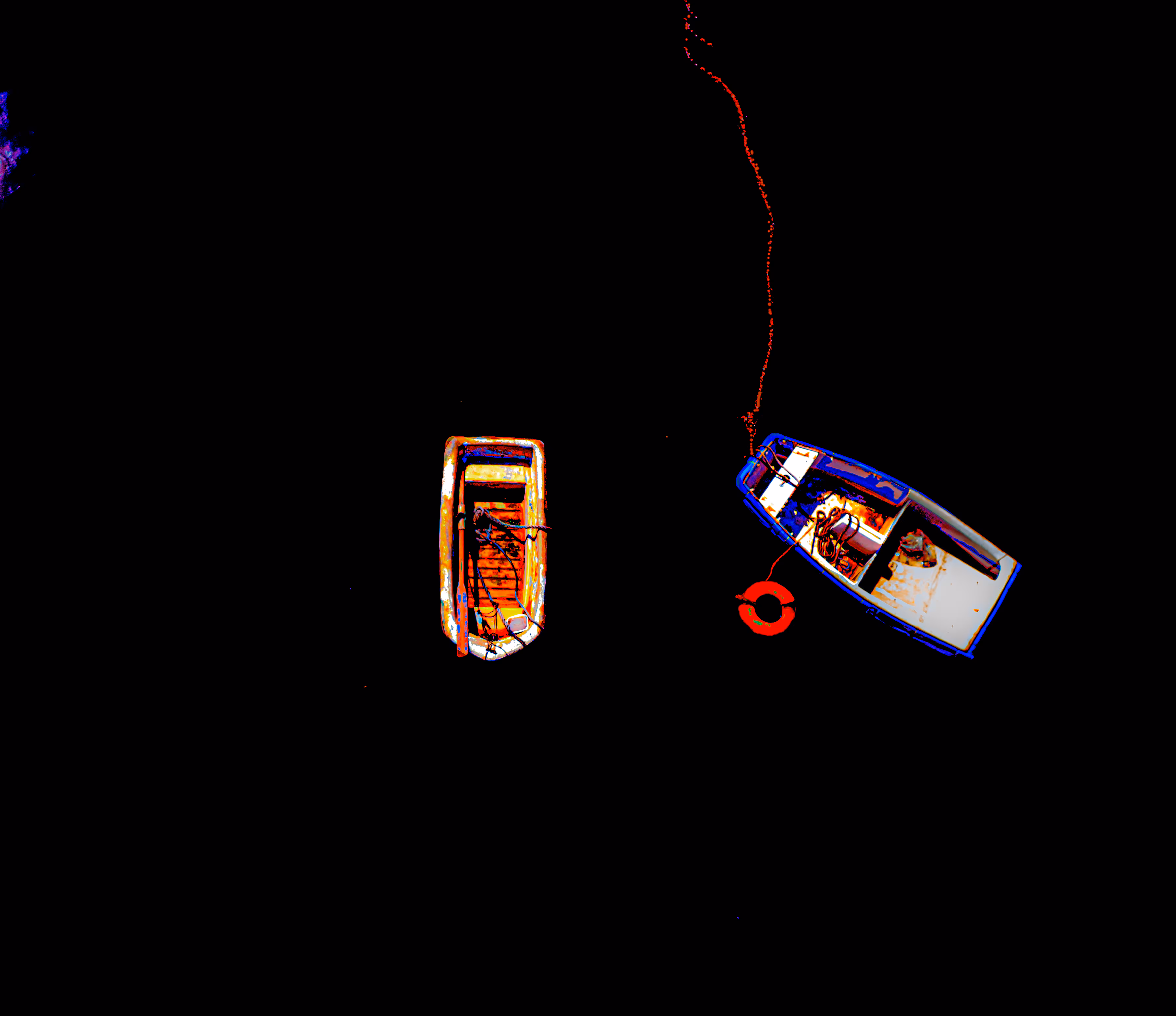Boats floating in the black night