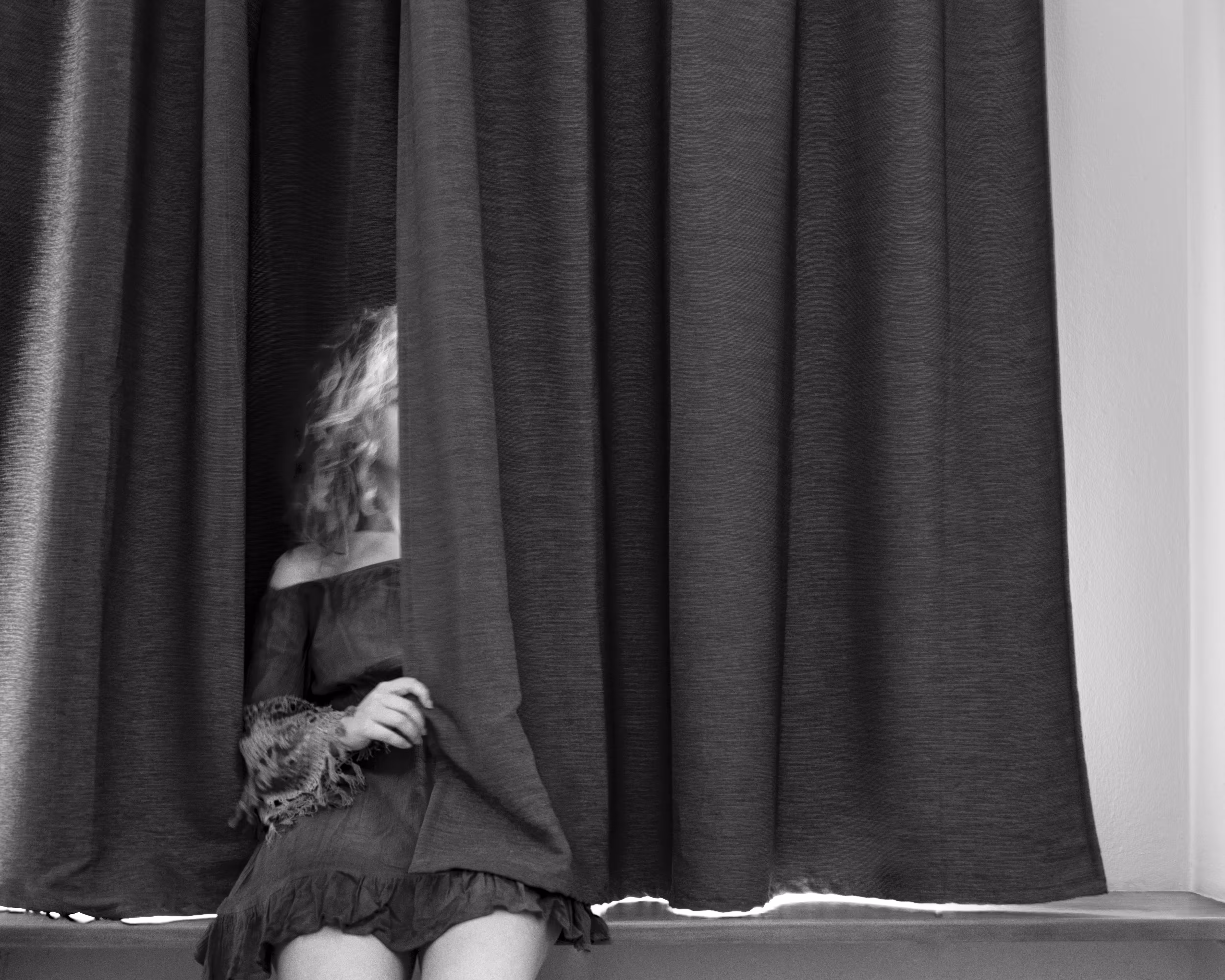 Behind the curtain