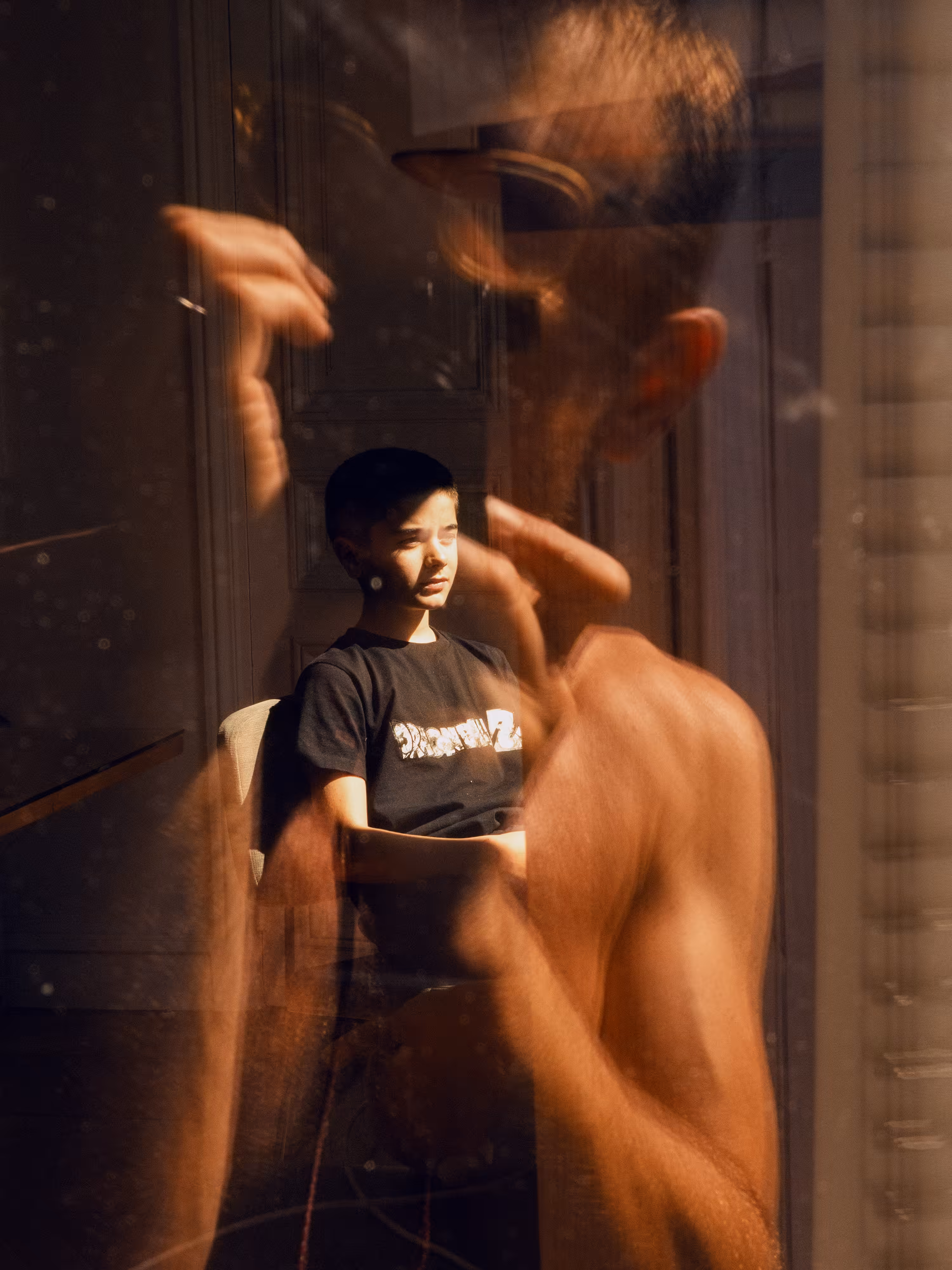 Atlas and self portrait reflection during lockdown
