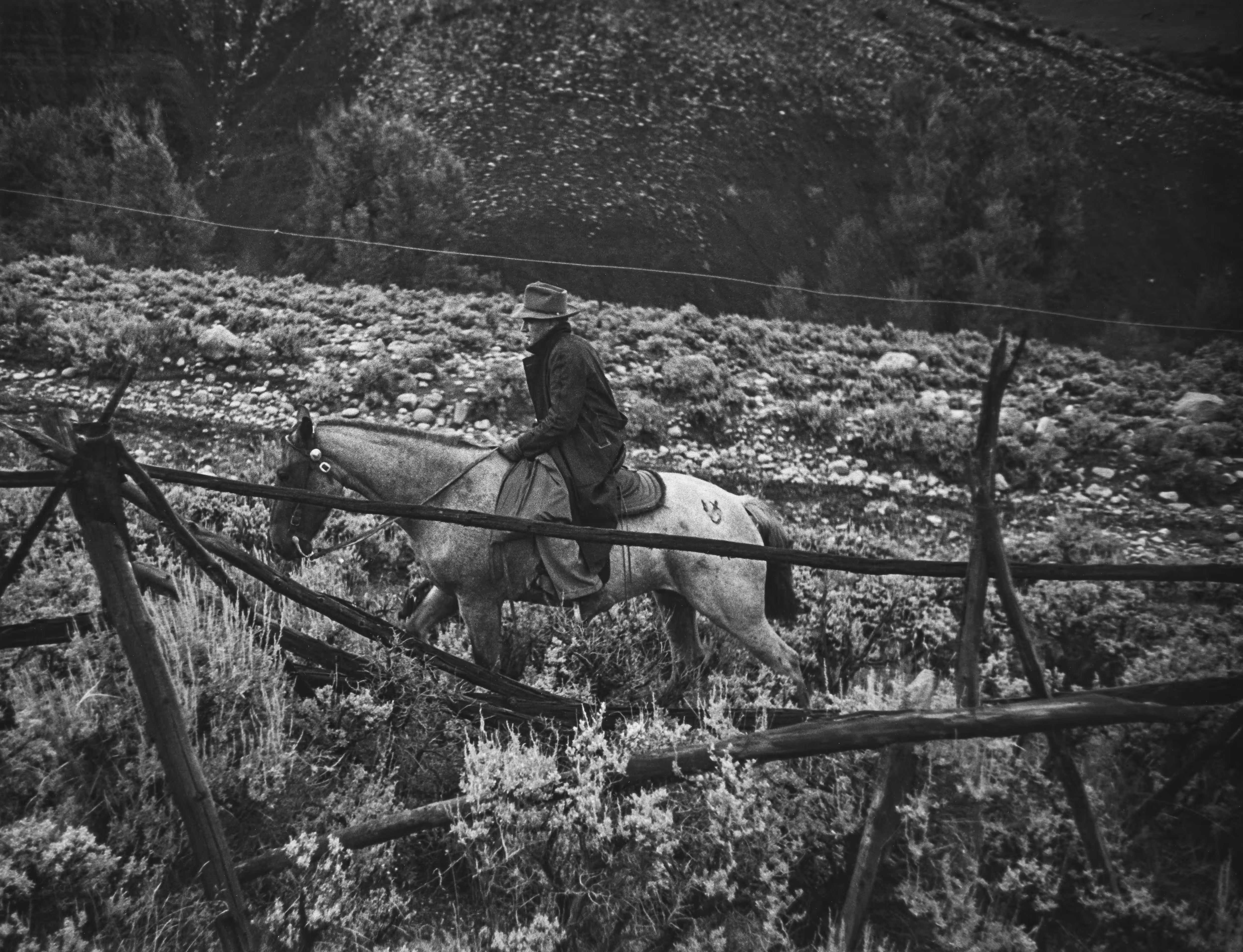 Country Doctor - Dr. Ernest Ceriani Takes a Rare Moment to Relax on Horseback Amidst Sagebrush