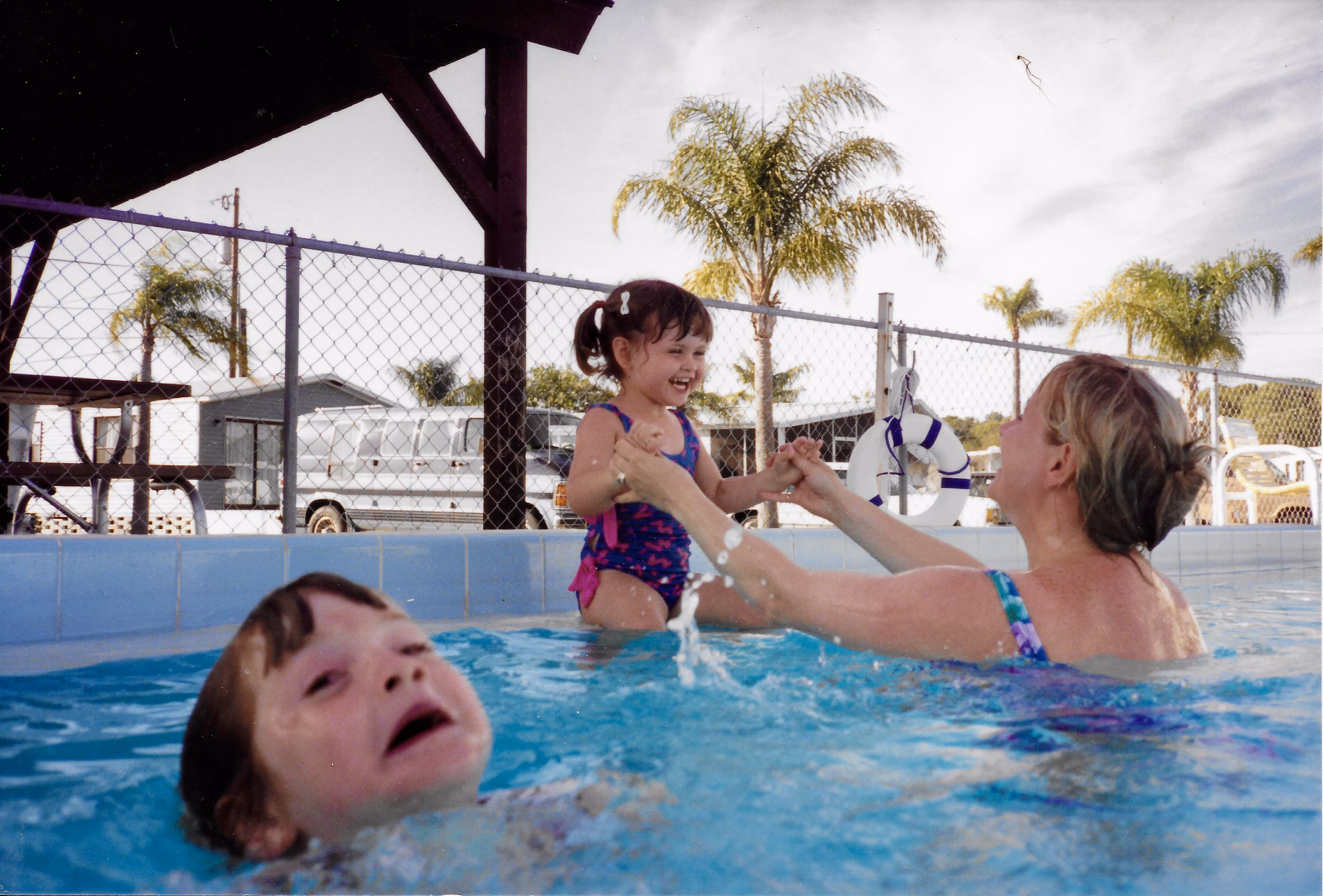 Mother Ignoring Kid Drowning In A Pool